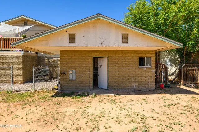 a view of a house with swimming pool
