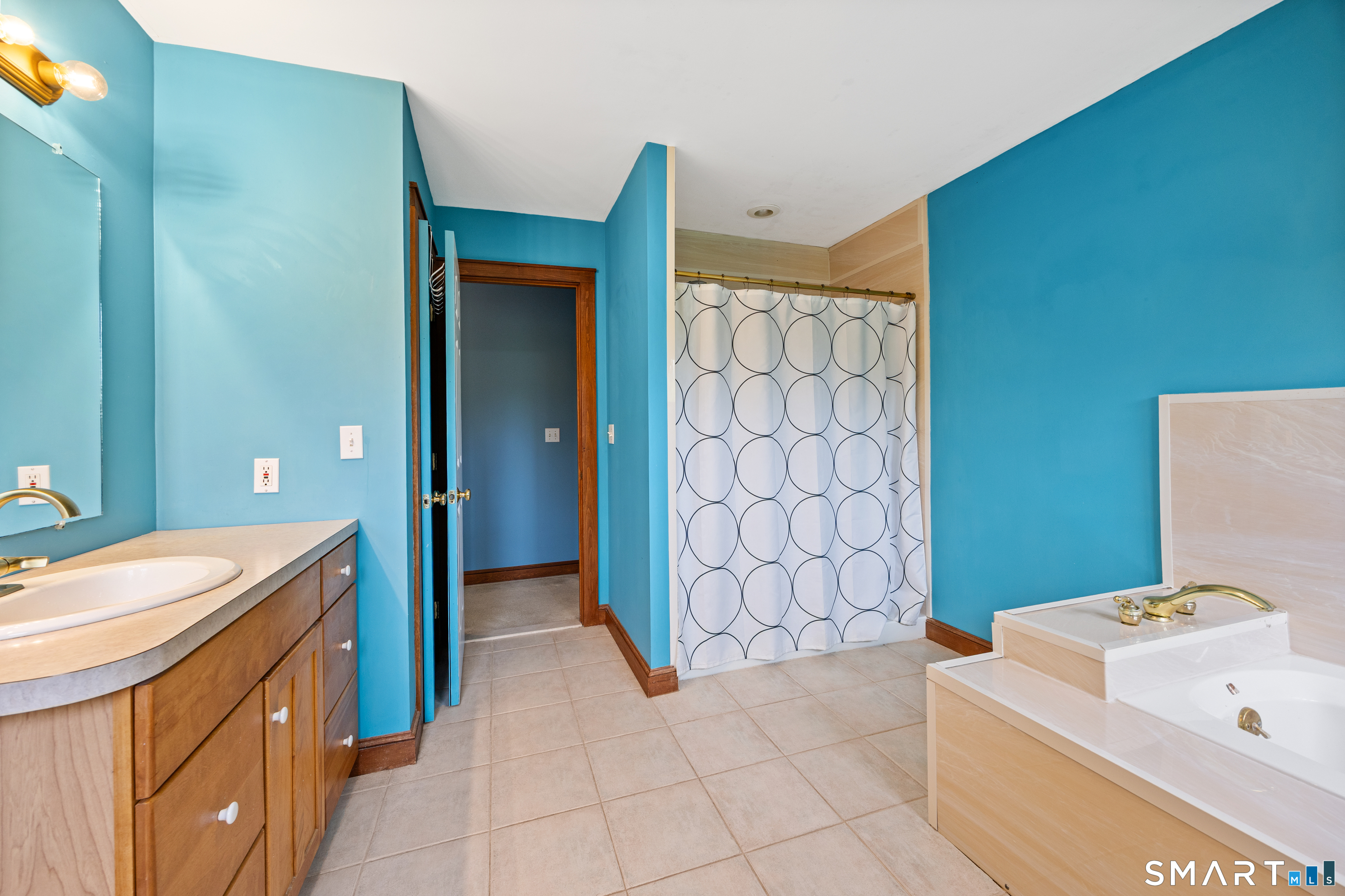 694 Millbrook Road Middletown, CT 06457 - Photo 25 of 34 a bathroom with a sink a toilet and shower