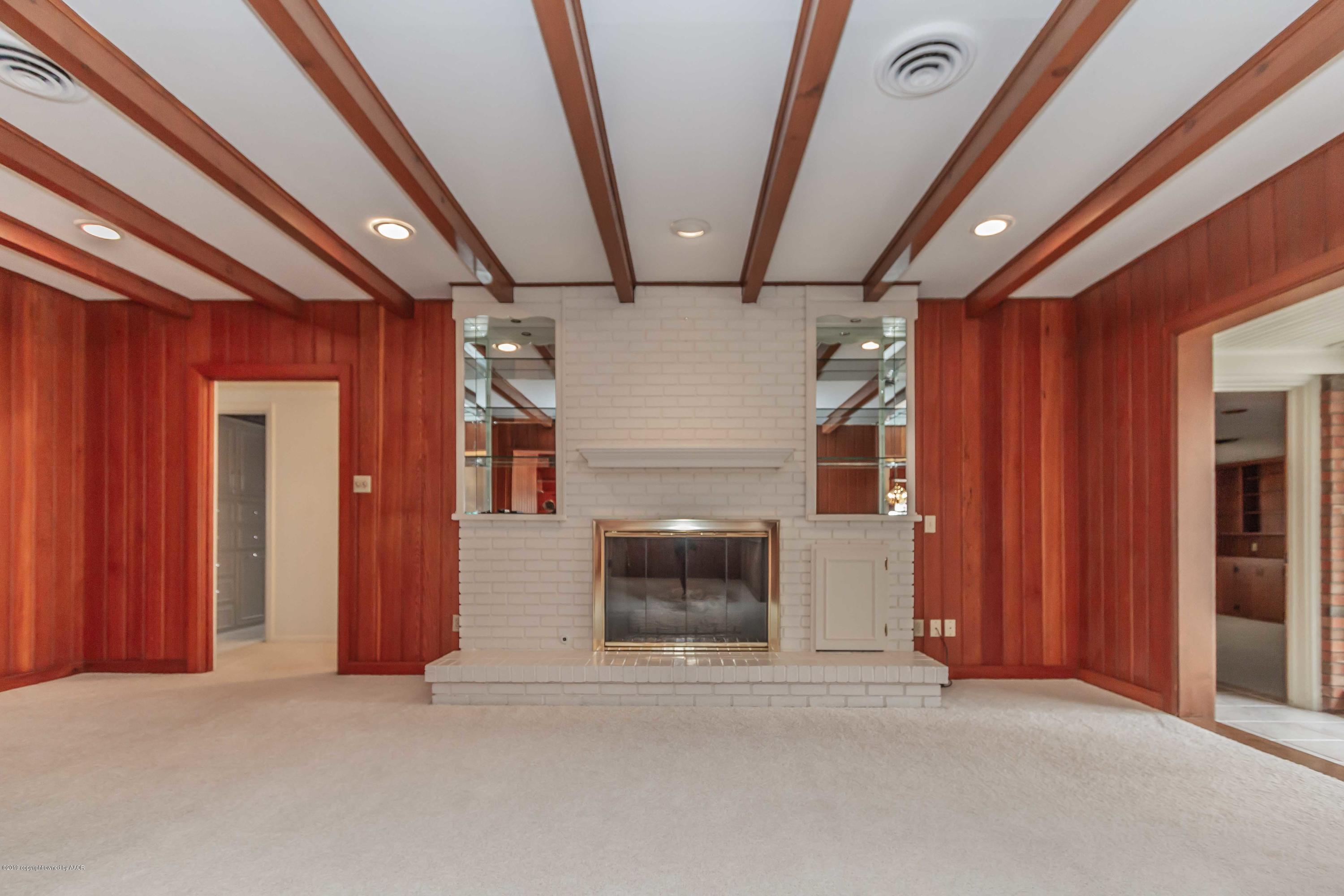 3228 South Travis Street Amarillo, TX 79109 - Photo 15 of 44 a view of a livingroom with a fireplace