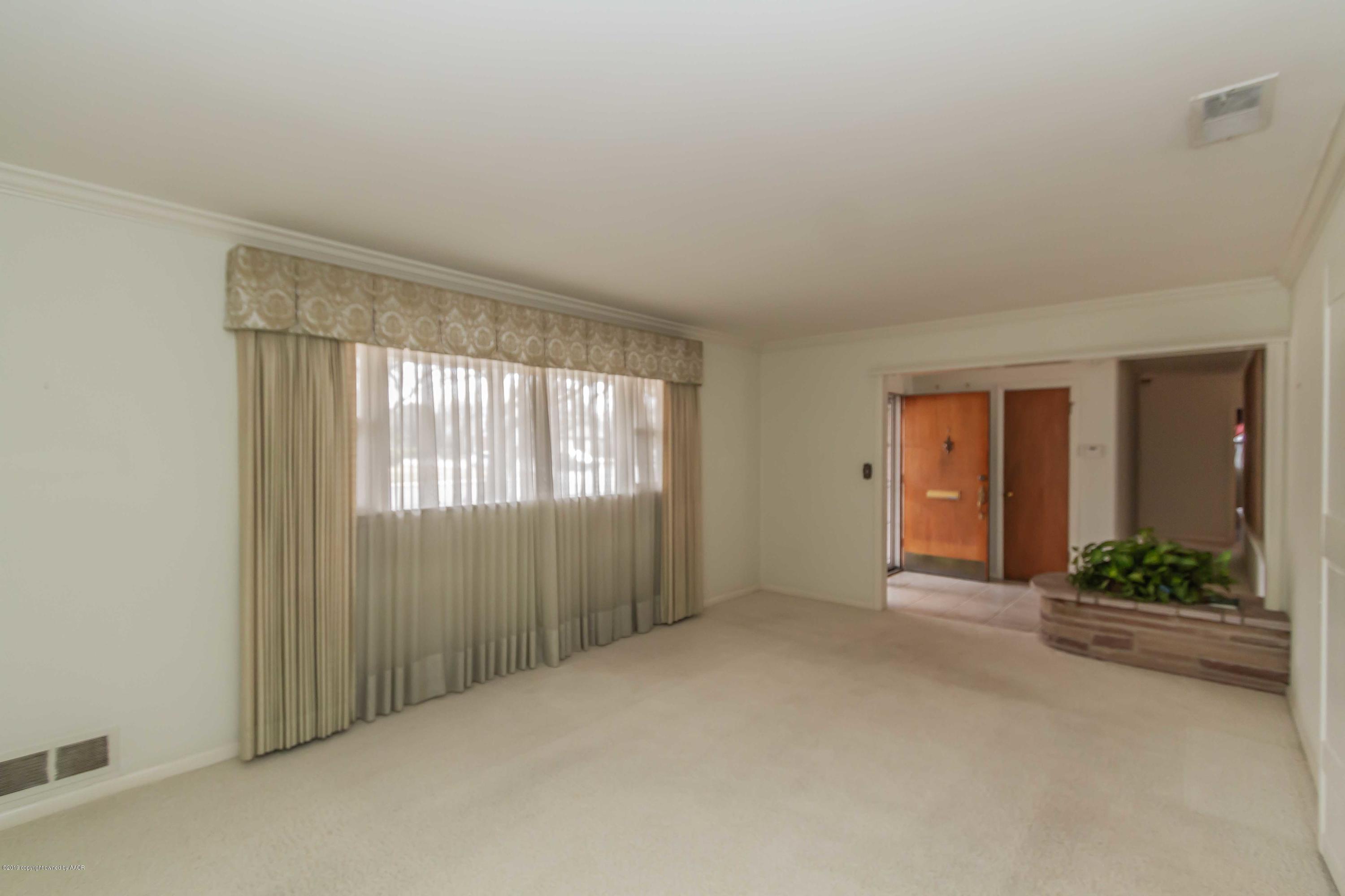 3228 South Travis Street Amarillo, TX 79109 - Photo 6 of 44 a view of a room with window