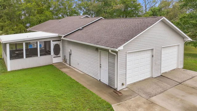 a view of a house with a yard