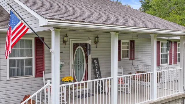 a view of a house with a porch