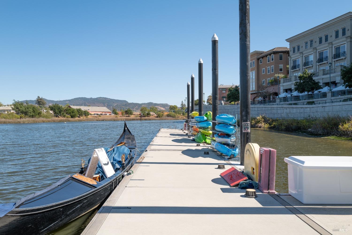 1072 Foster Road Napa, CA 94558 - Photo 21 of 28 a view of a balcony with chairs and wooden floor