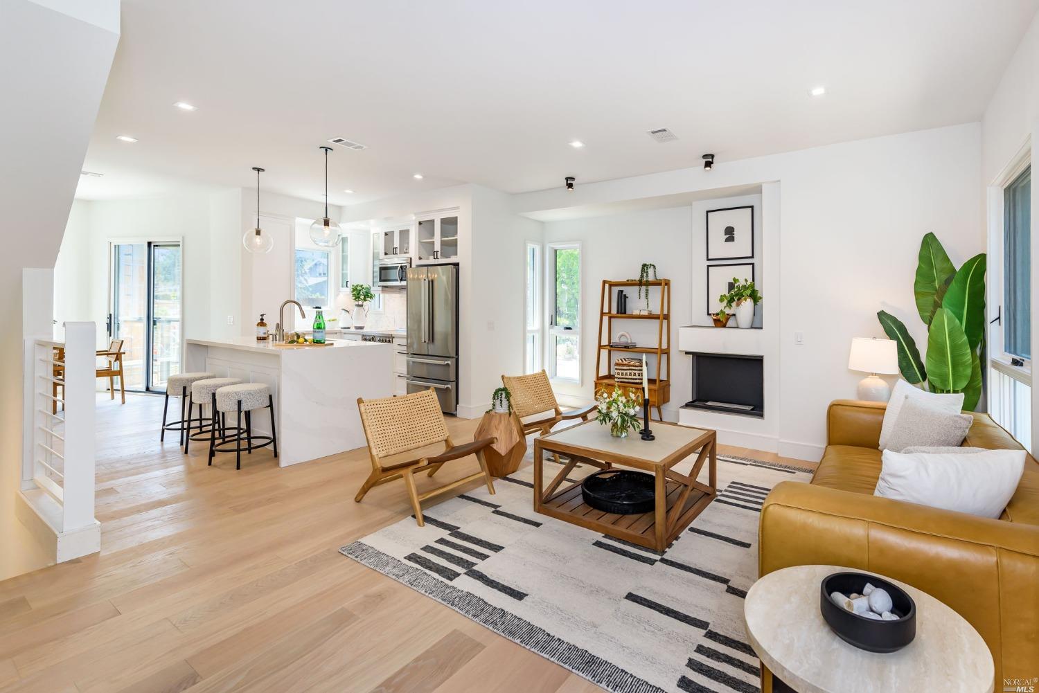 1072 Foster Road Napa, CA 94558 - Photo 4 of 28 a living room with furniture and a fireplace