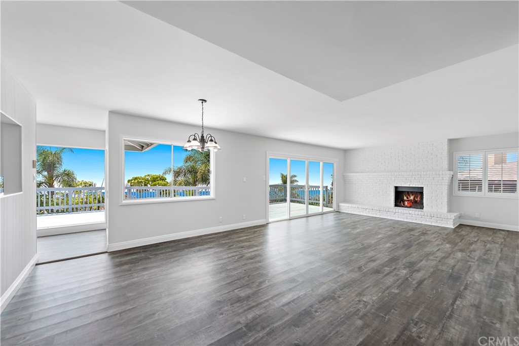 2809 Chillon Way Laguna Beach, CA 92651 - Photo 2 of 32 a view of an empty room with window and wooden floor