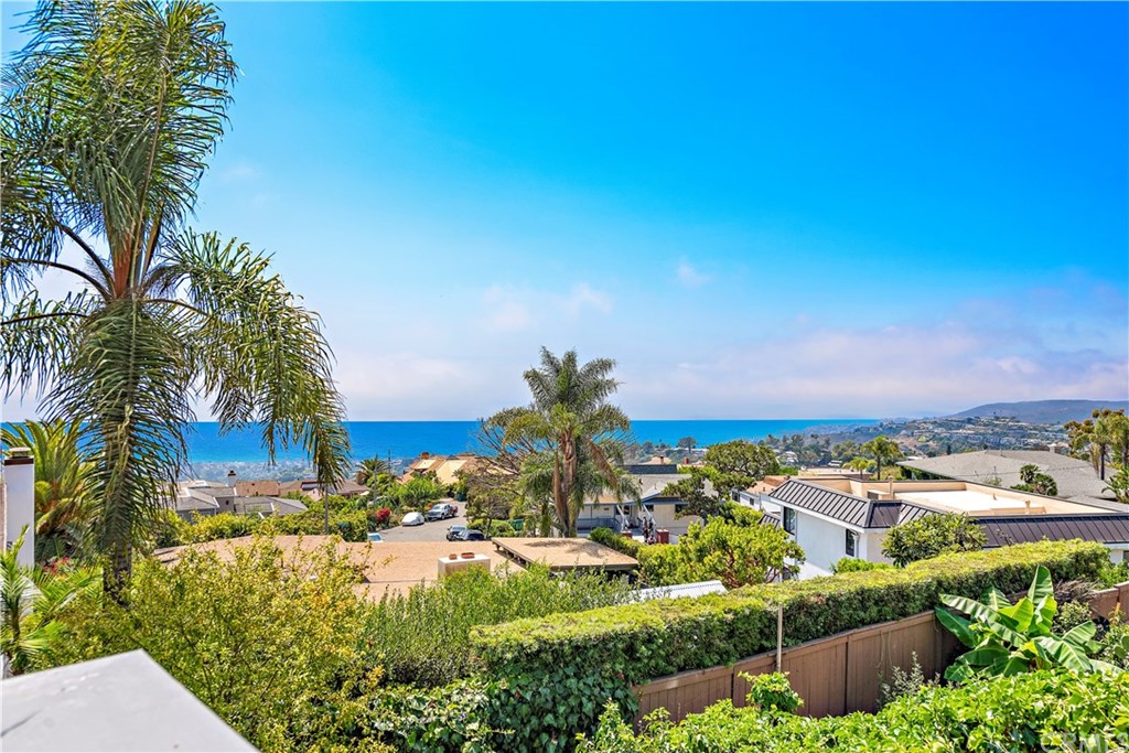 2809 Chillon Way Laguna Beach, CA 92651 - Photo 27 of 32 a view of a house with a yard and potted plants