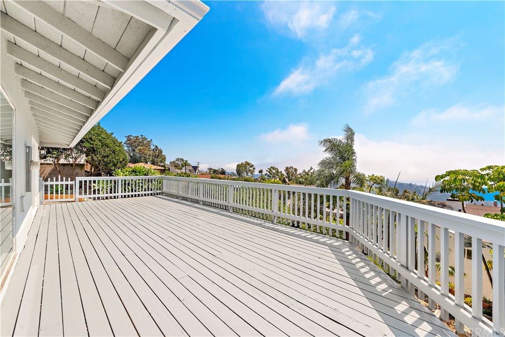 2809 Chillon Way Laguna Beach, CA 92651 - Photo 28 of 32 a view of a balcony with wooden floor and fence