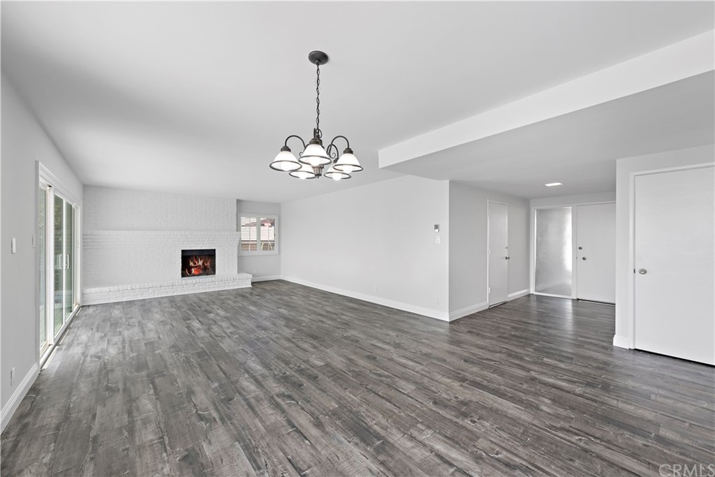 2809 Chillon Way Laguna Beach, CA 92651 - Photo 10 of 32 a view of a livingroom with a chandelier wooden floor and chandelier