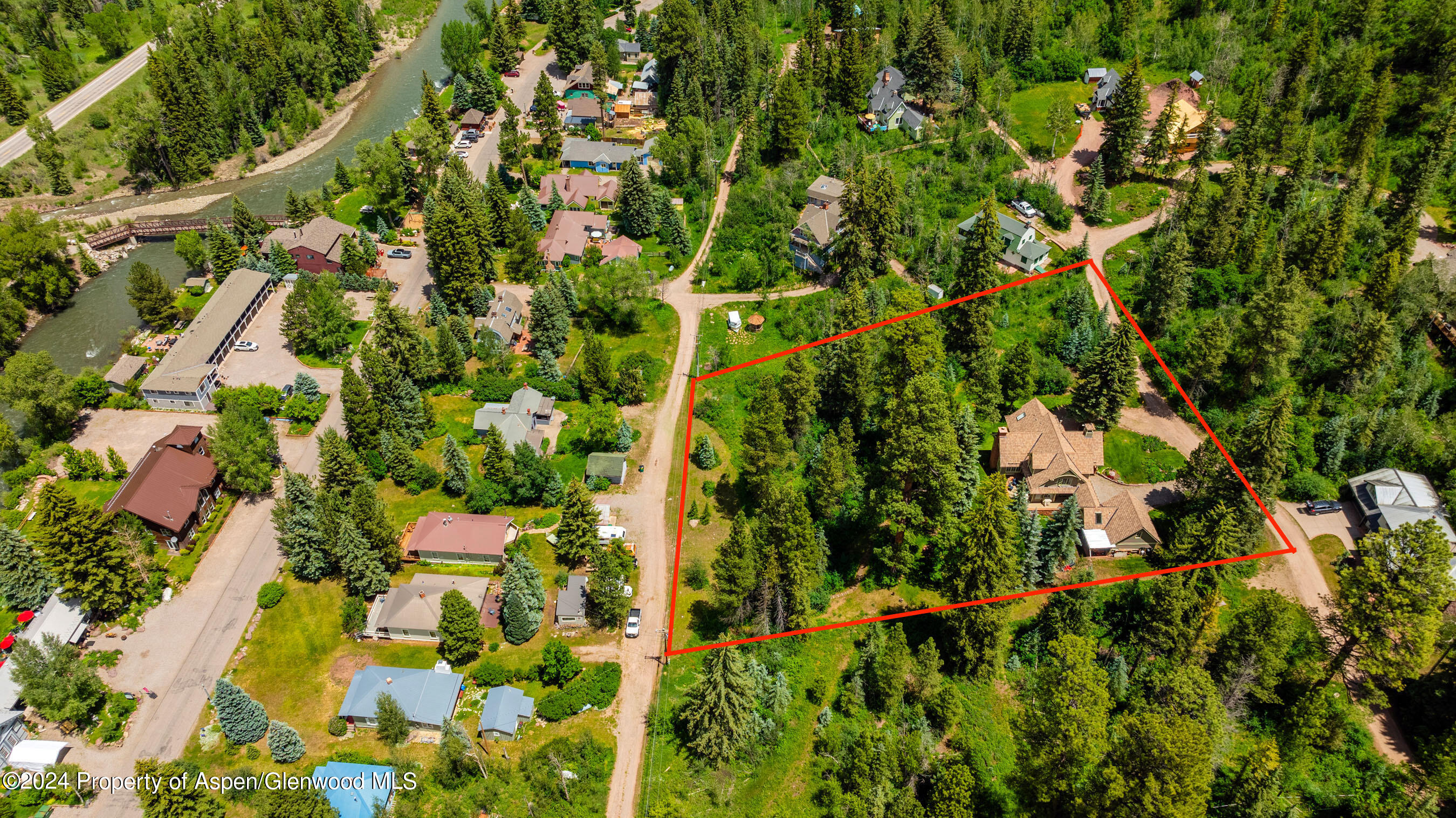 102 Firehouse Road Redstone, CO 81623 - Photo 11 of 50 an aerial view of residential houses with yard and outdoor space
