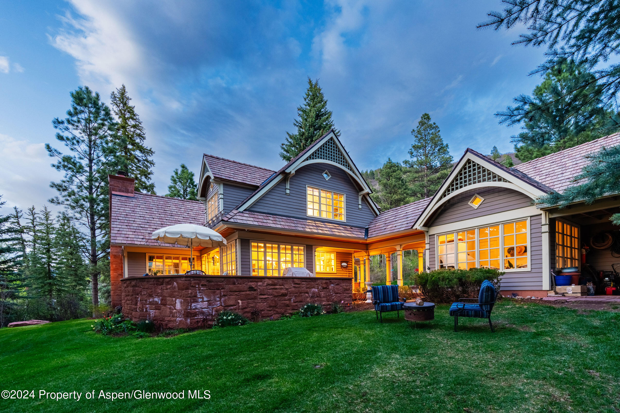 102 Firehouse Road Redstone, CO 81623 - Photo 12 of 50 a front view of a house with a garden