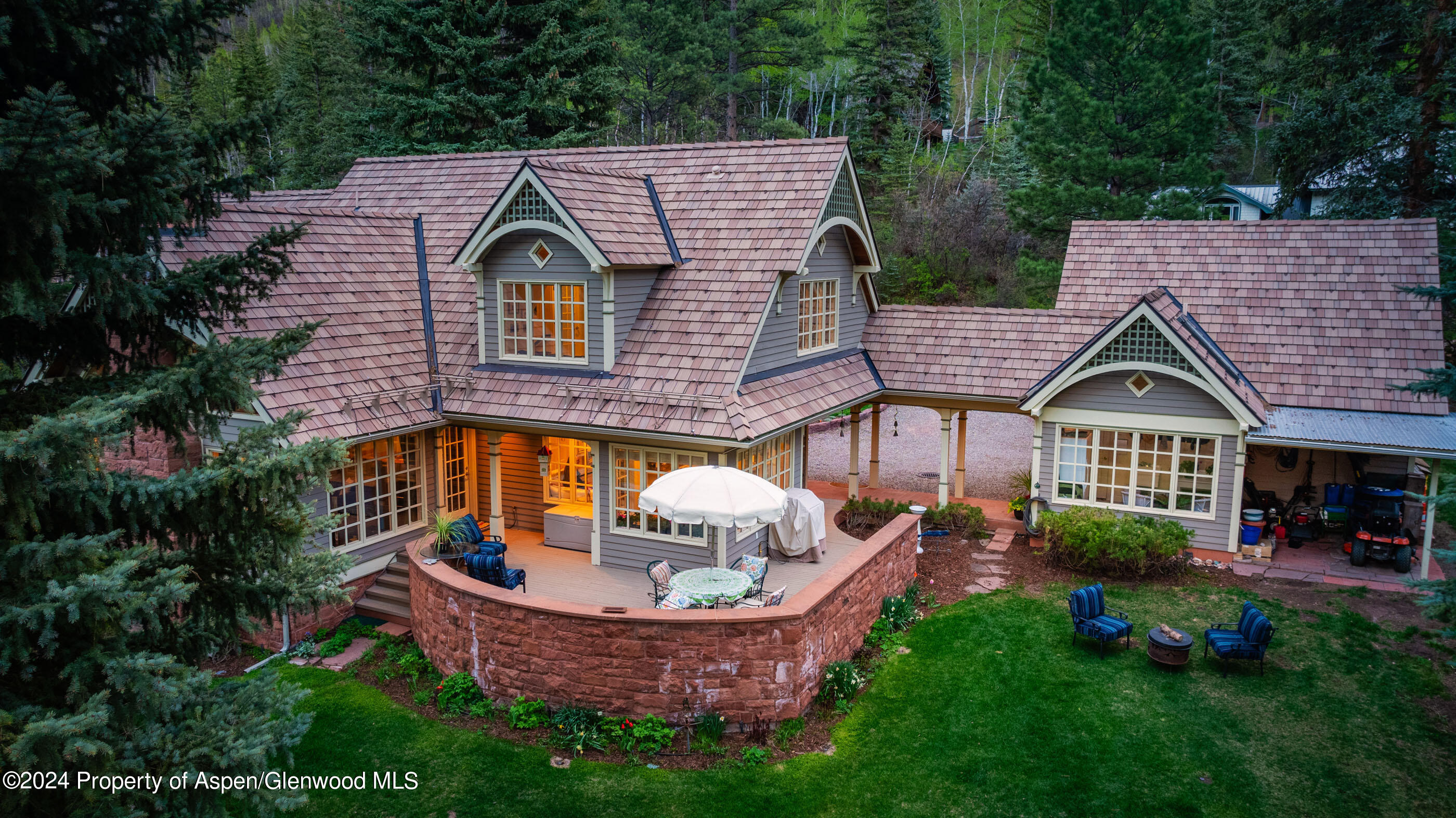 102 Firehouse Road Redstone, CO 81623 - Photo 13 of 50 a view of a house with a yard and furniture
