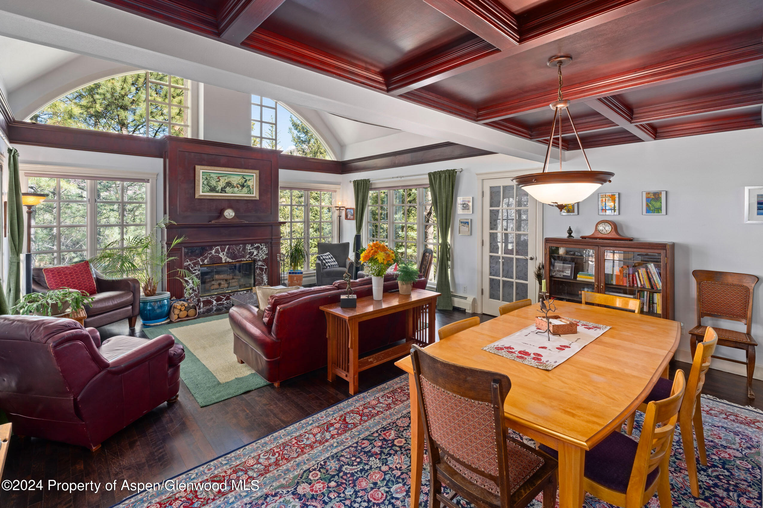 102 Firehouse Road Redstone, CO 81623 - Photo 16 of 50 a living room with fireplace furniture and a large window