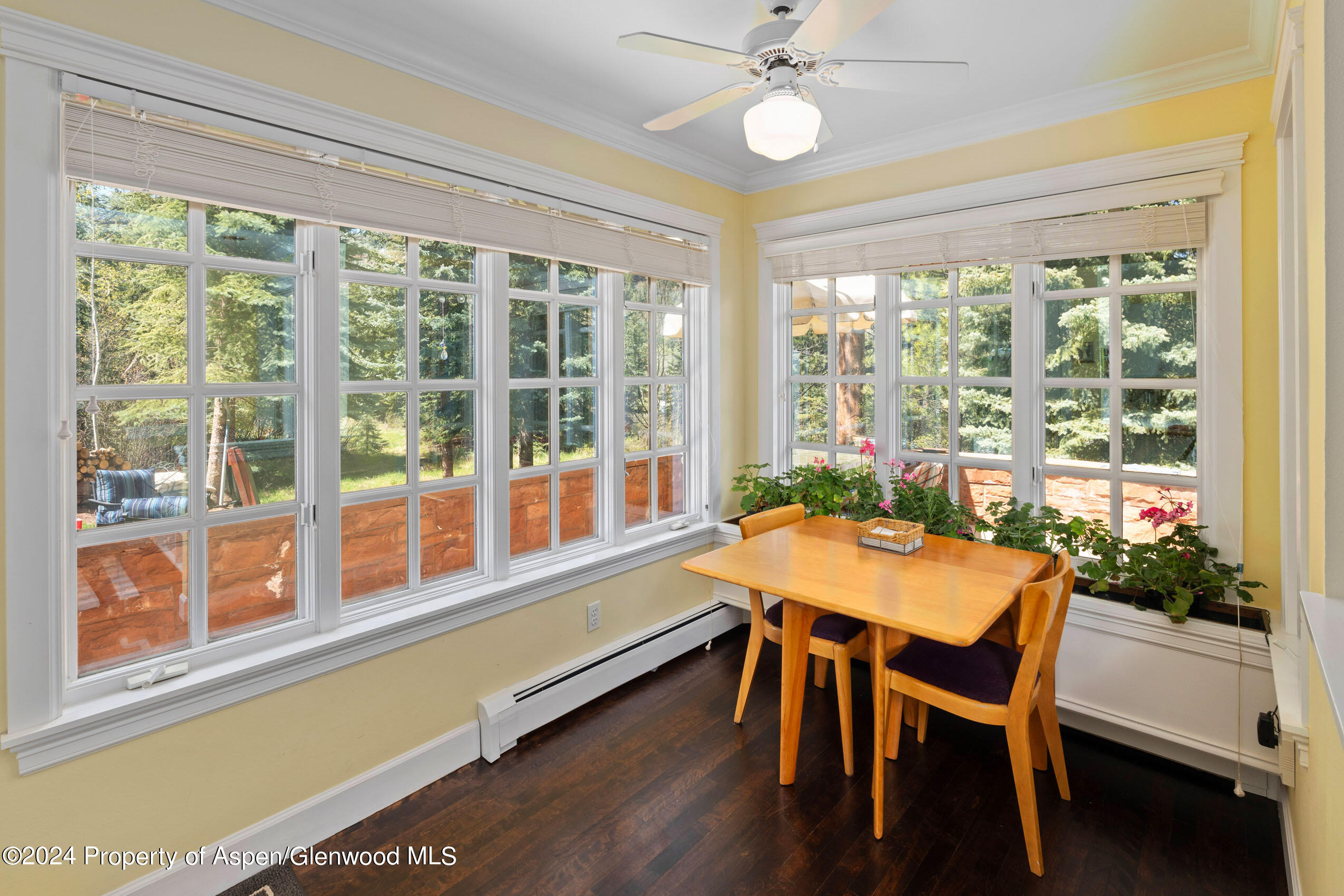 102 Firehouse Road Redstone, CO 81623 - Photo 24 of 50 a dining room with furniture window and wooden floor