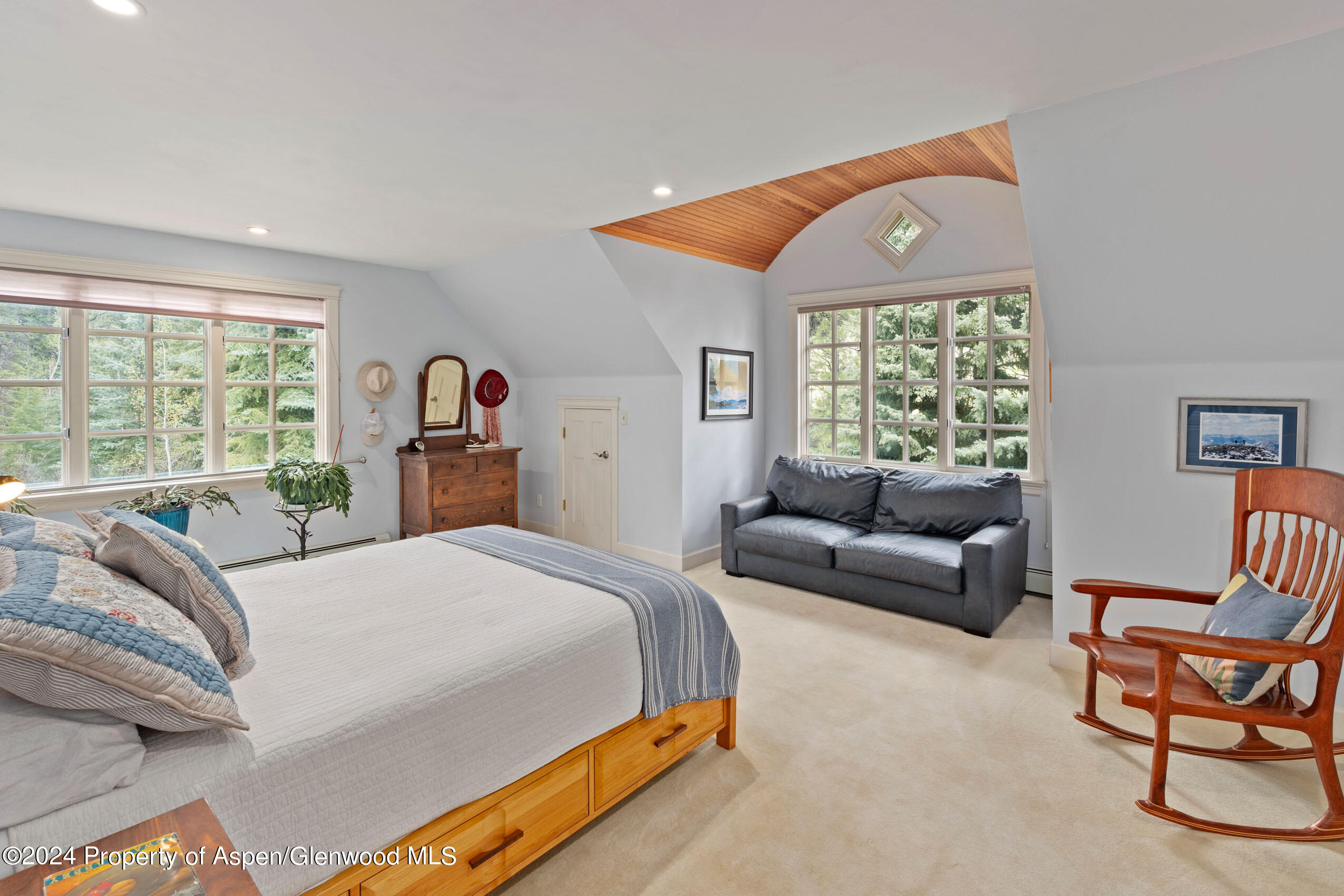 102 Firehouse Road Redstone, CO 81623 - Photo 30 of 50 a bedroom with a bed and a couch