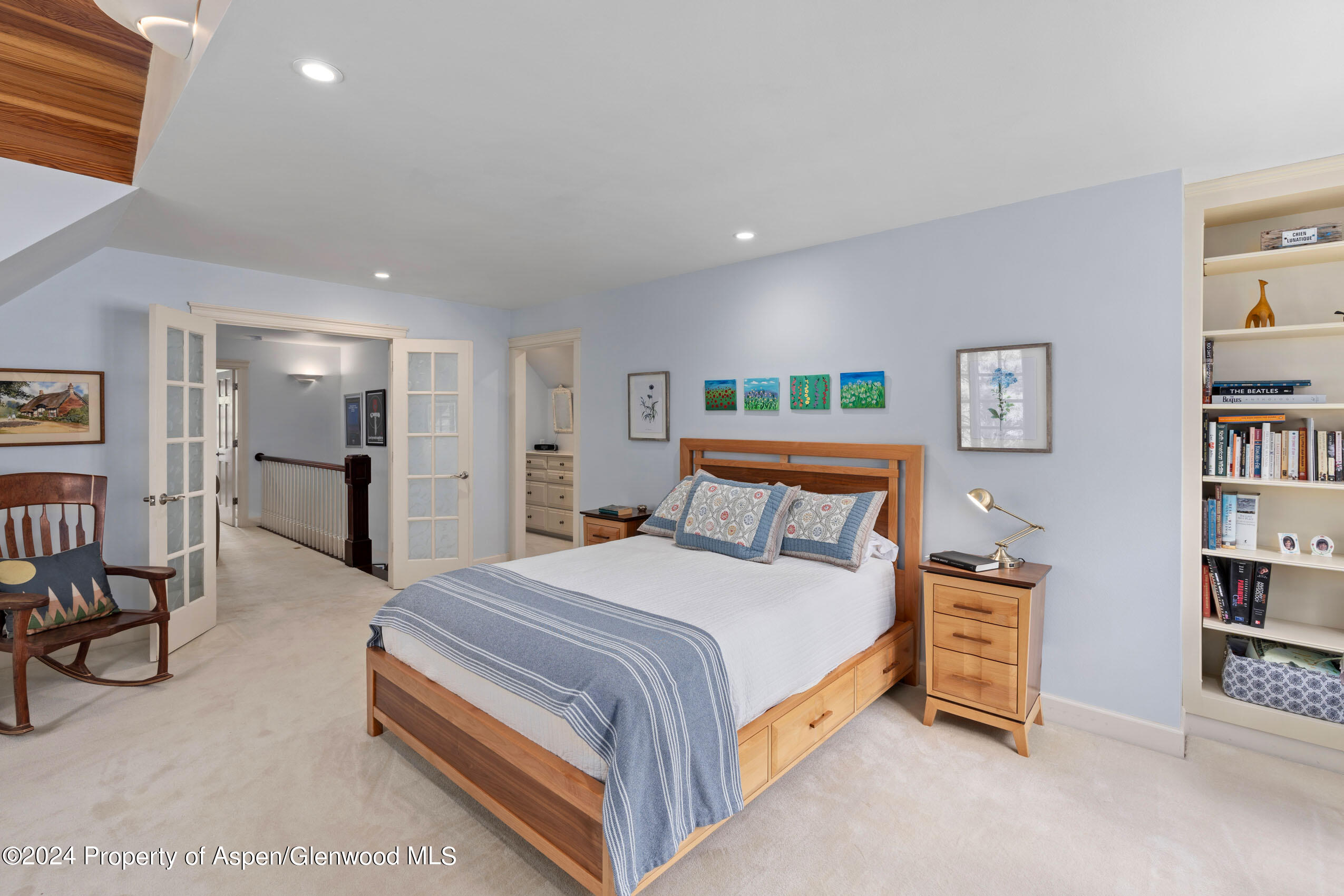 102 Firehouse Road Redstone, CO 81623 - Photo 31 of 50 a spacious bedroom with a bed and a walk in closet