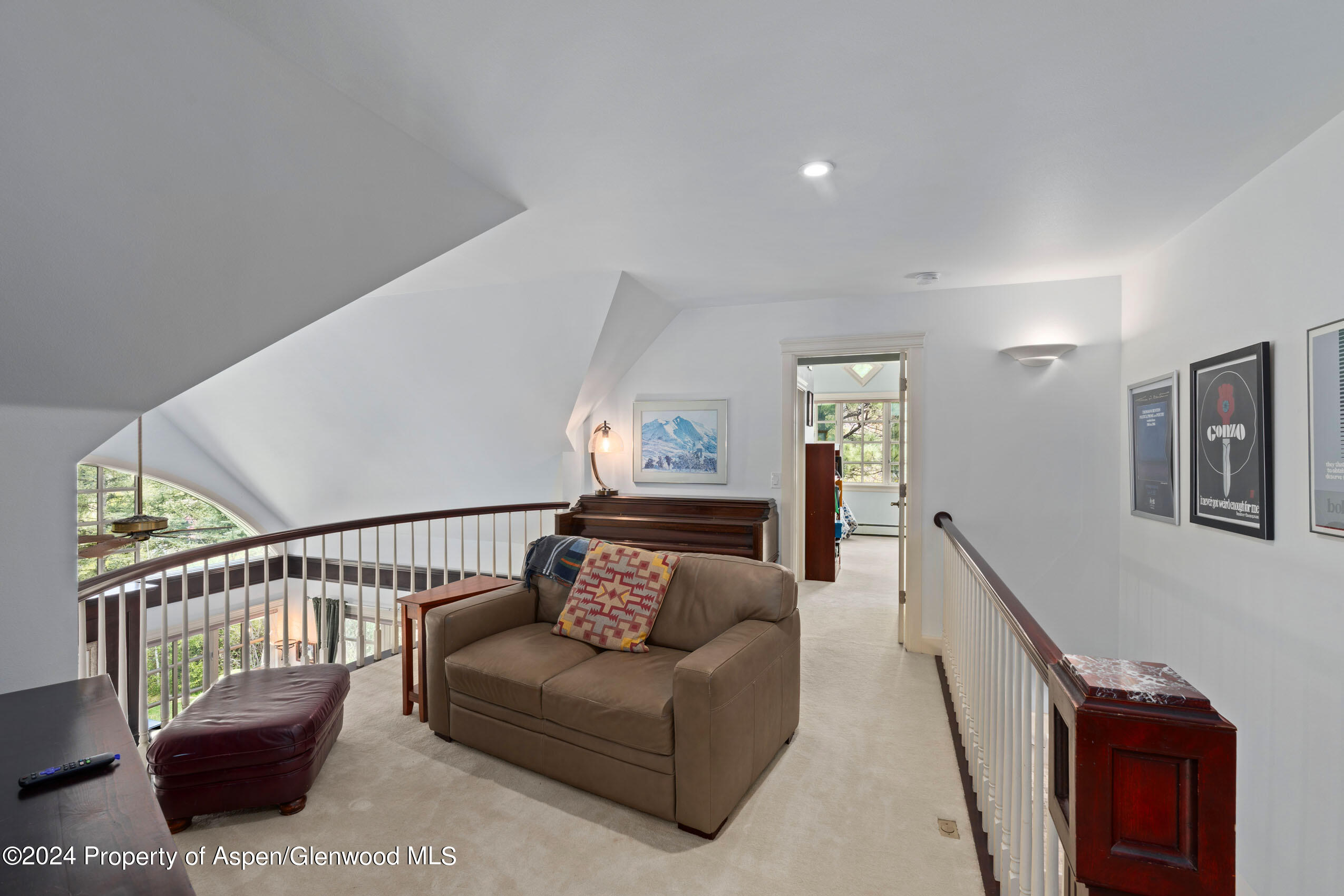 102 Firehouse Road Redstone, CO 81623 - Photo 37 of 50 a living room with furniture and stairs