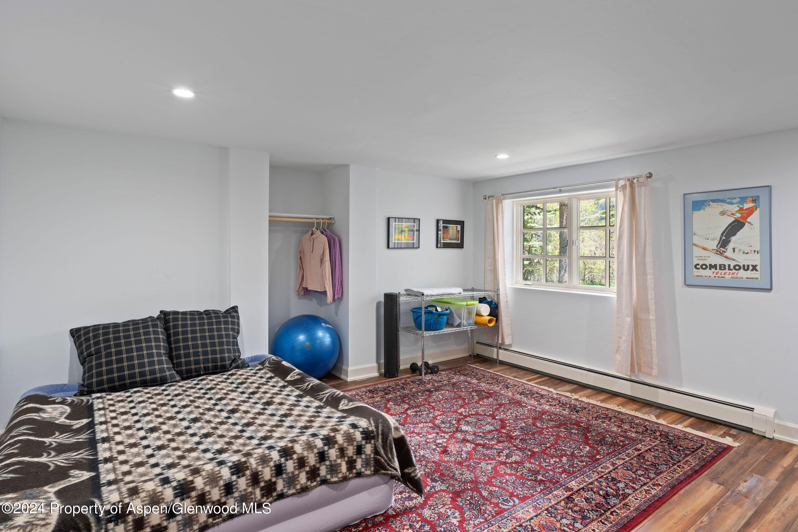 102 Firehouse Road Redstone, CO 81623 - Photo 38 of 50 a bedroom with bed and window