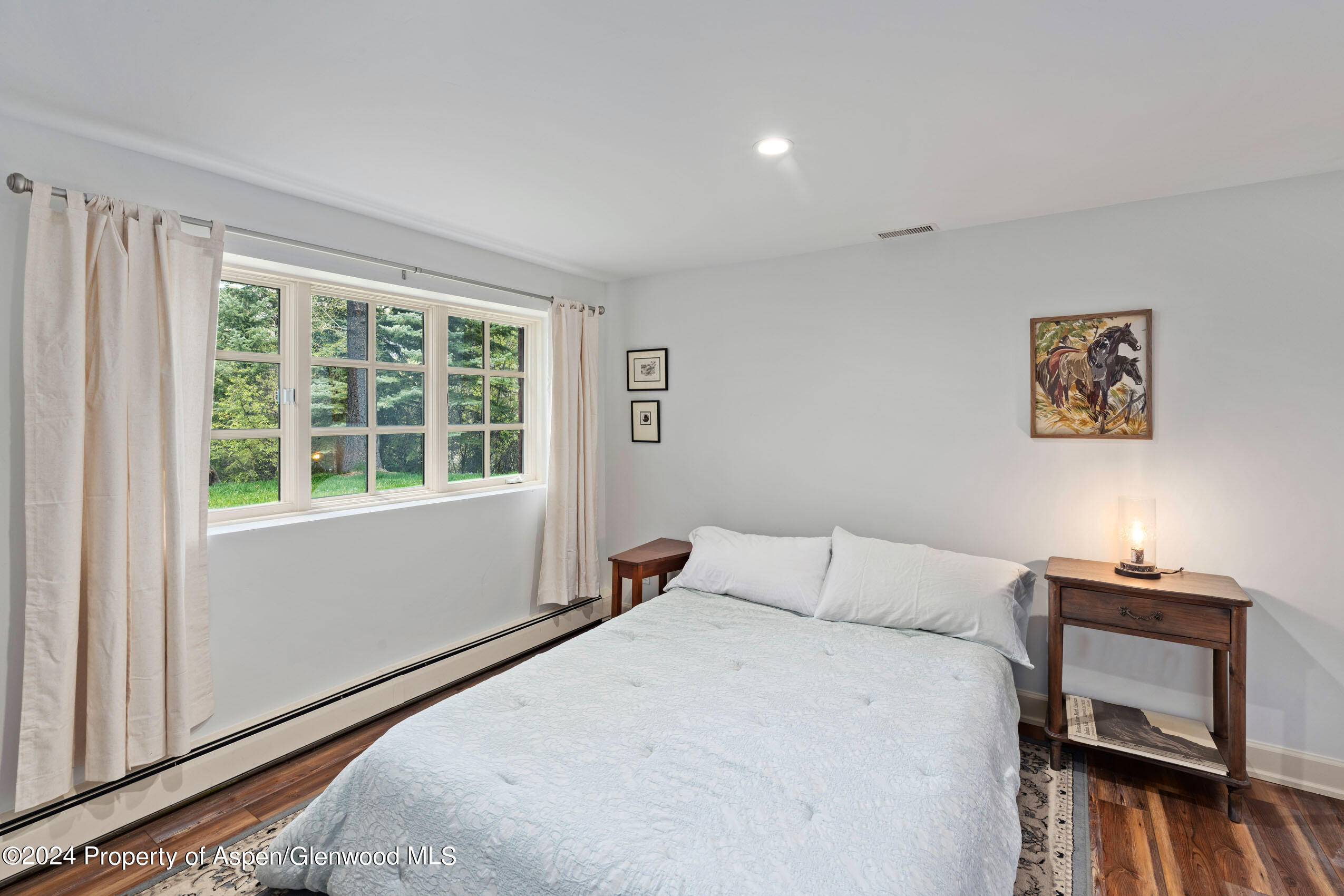 102 Firehouse Road Redstone, CO 81623 - Photo 40 of 50 a bedroom with a bed and a window