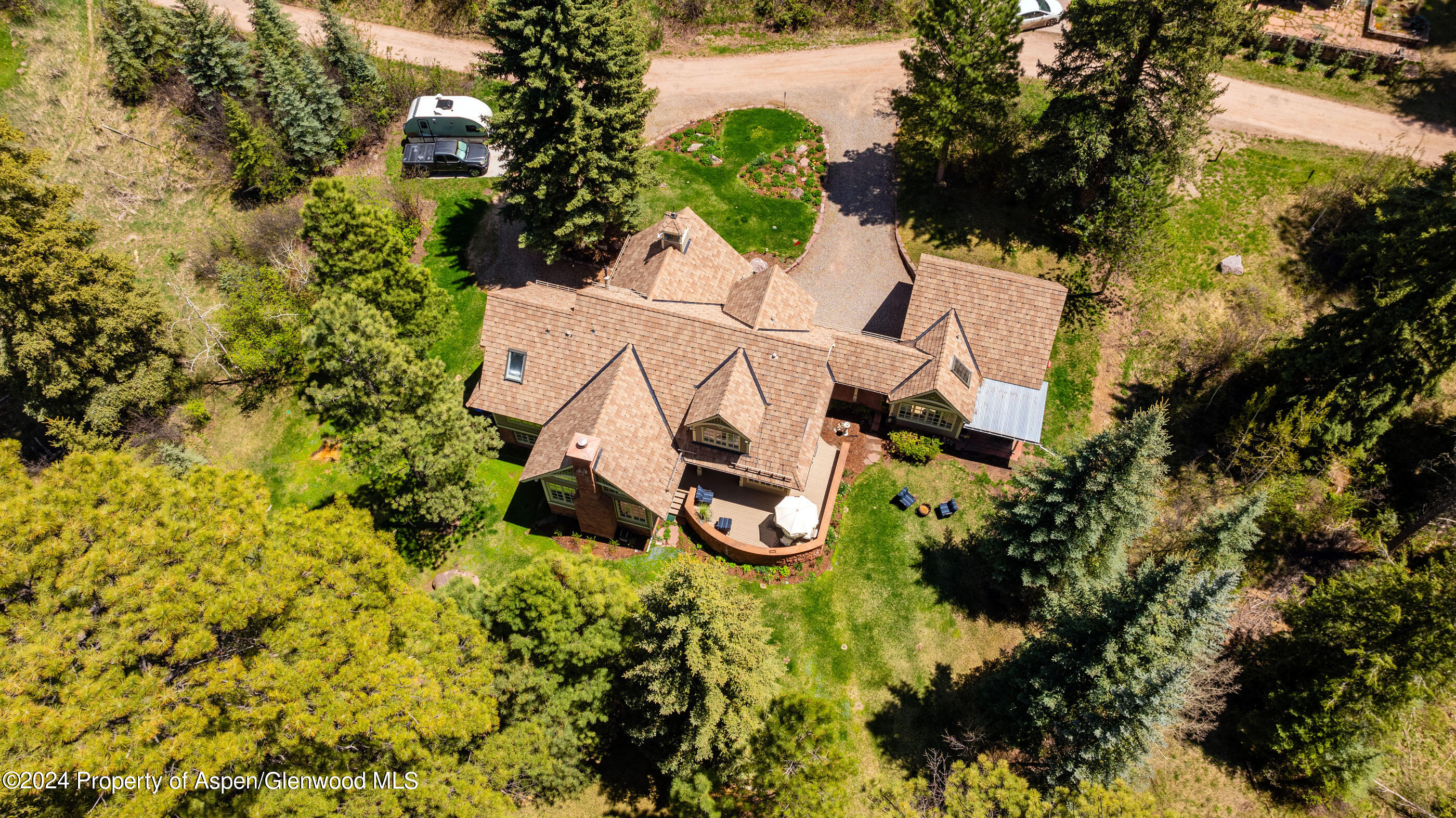 102 Firehouse Road Redstone, CO 81623 - Photo 44 of 50 an aerial view of a house with garden space and street view