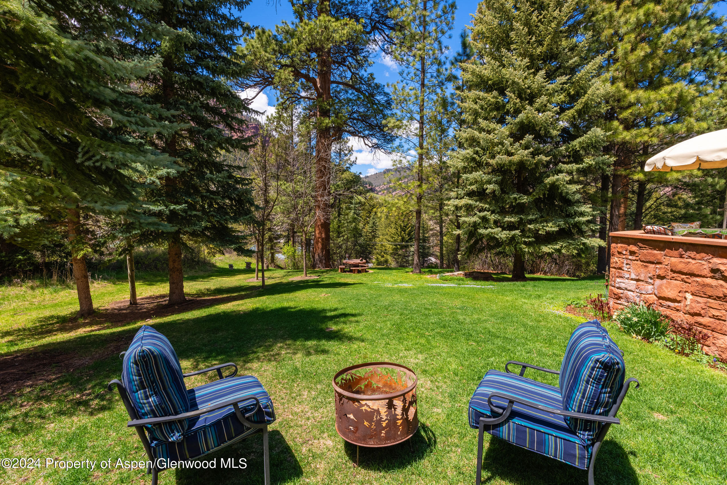 102 Firehouse Road Redstone, CO 81623 - Photo 45 of 50 a view of a two chairs in a yard
