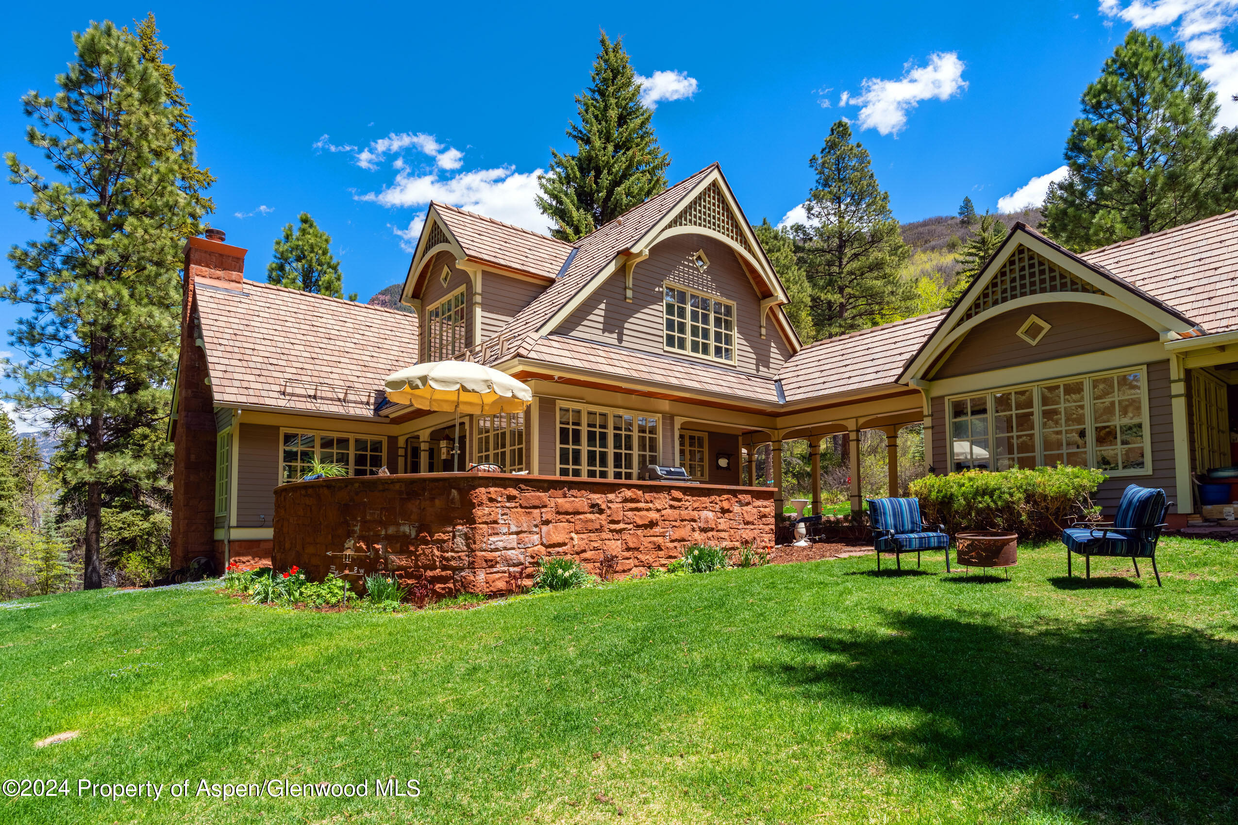 102 Firehouse Road Redstone, CO 81623 - Photo 46 of 50 a front view of a house with a yard