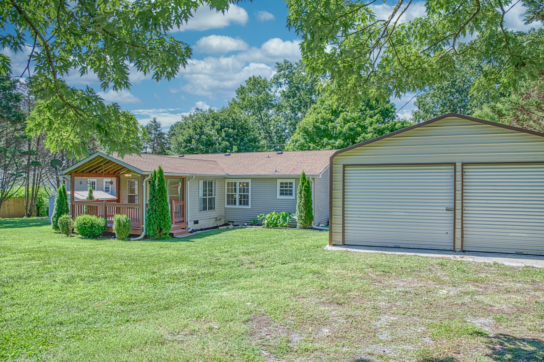2085 Herbert Garrett Road Cookeville, TN 38506 - Photo 35 of 39 a view of a house with a yard