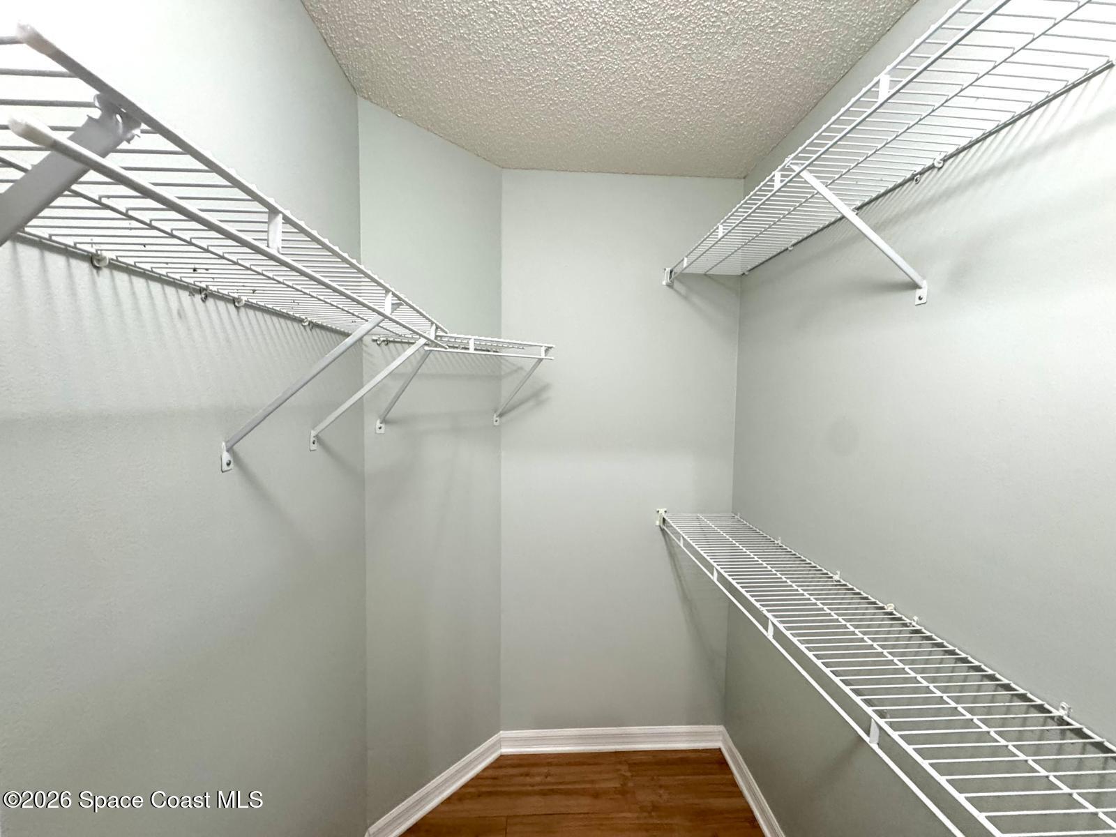 2168 Misty Way Lane Melbourne, FL 32935 - Photo 11 of 19 a view of a room with racks on the wall