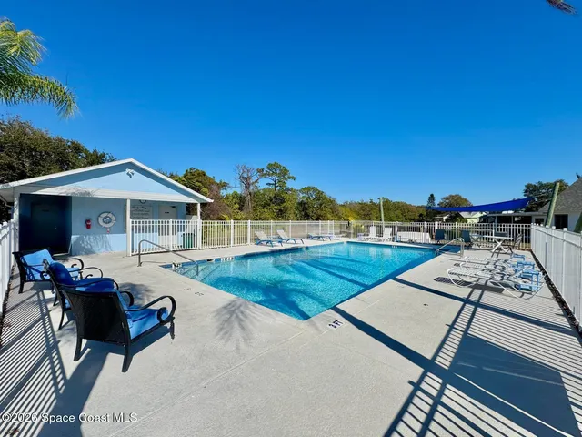 a view of a terrace with chairs