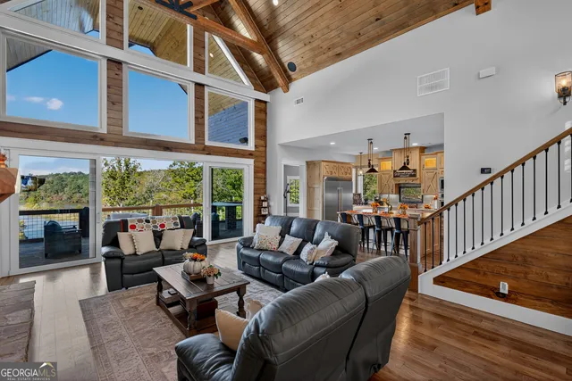 a spacious bedroom with a bed and a table