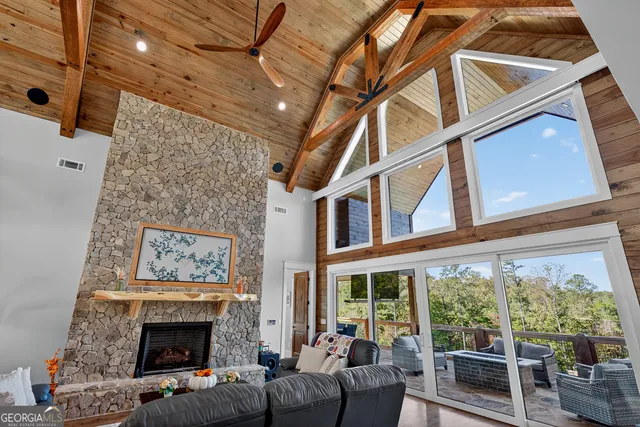 a outdoor living space with furniture and a potted plant