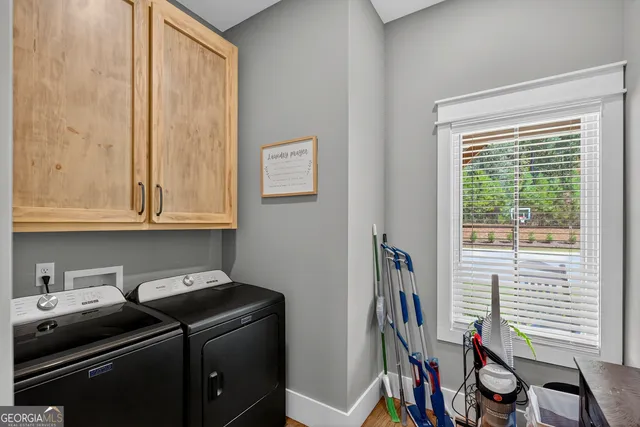 a bedroom with a bed and a table