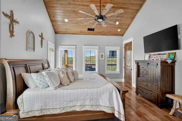 an aerial view of a house with outdoor space swimming pool and mountains