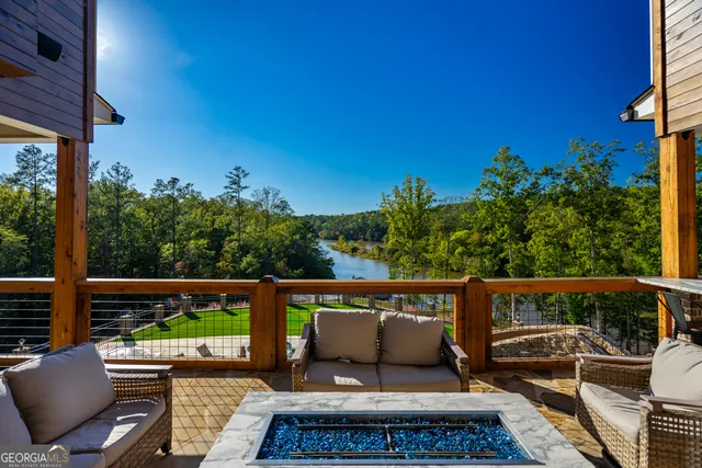 a view of a house with a yard porch and sitting area