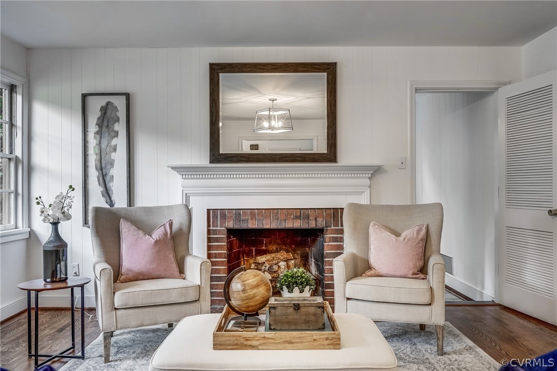1606 Princeton Road Richmond, VA 23227 - Photo 5 of 37 a living room with furniture a rug and a fireplace