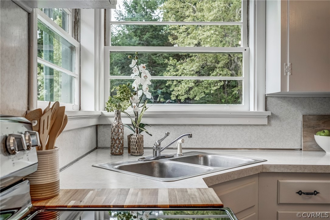 1606 Princeton Road Richmond, VA 23227 - Photo 10 of 37 a kitchen with a sink and large window