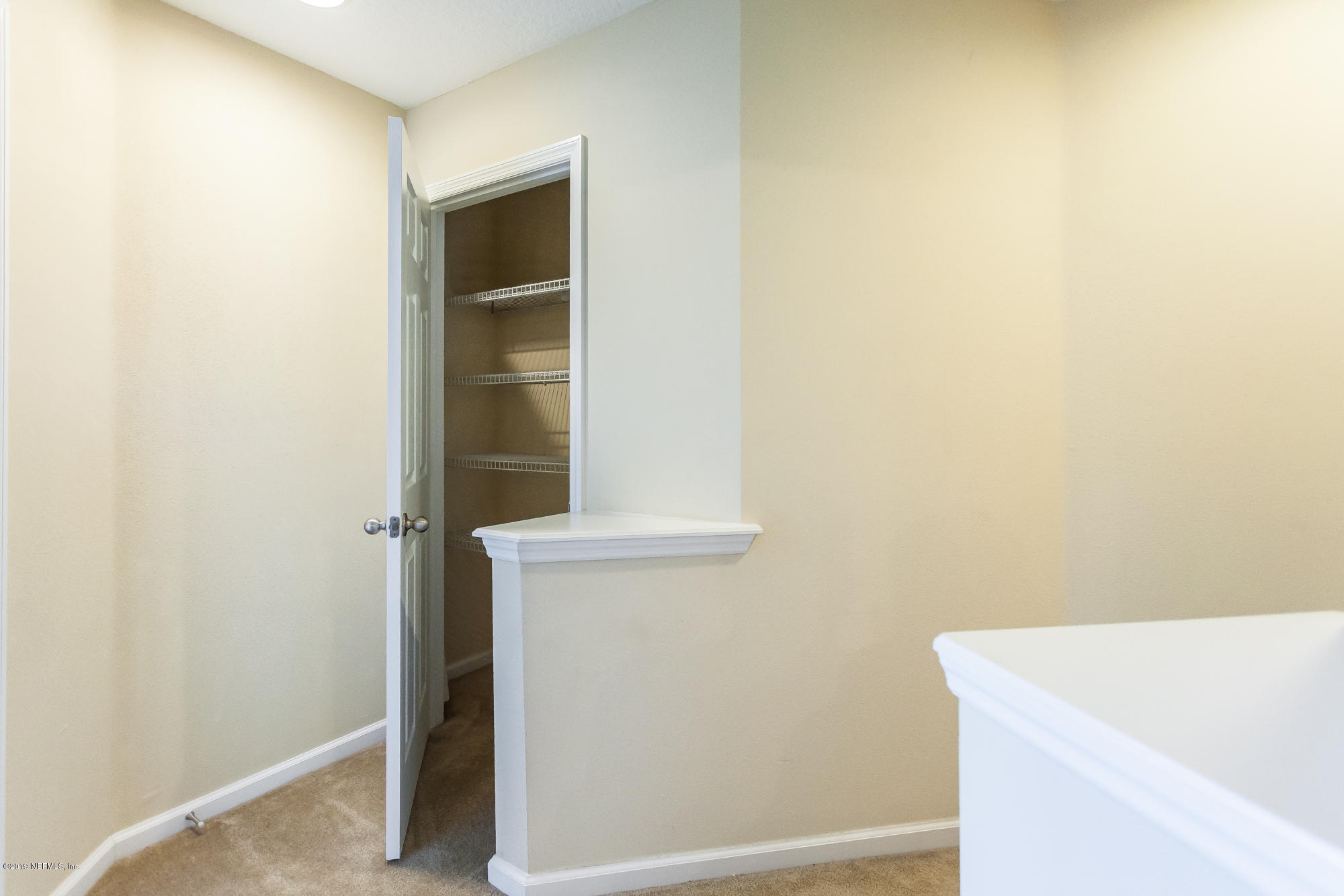 3256 Chestnut Ridge Way Orange Park, FL 32065 - Photo 18 of 39 a bathroom with a sink