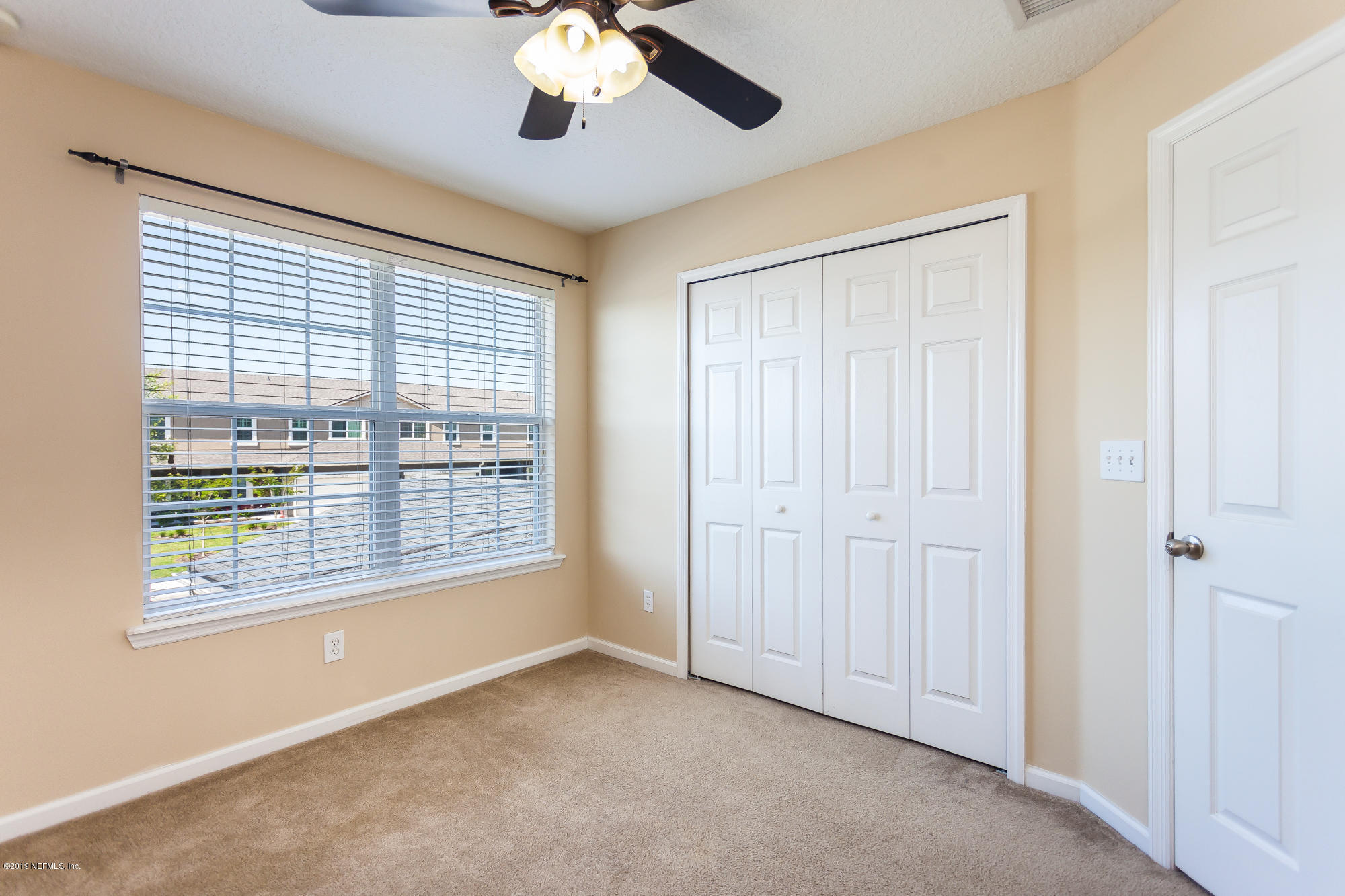 3256 Chestnut Ridge Way Orange Park, FL 32065 - Photo 20 of 39 a view of an empty room with a window