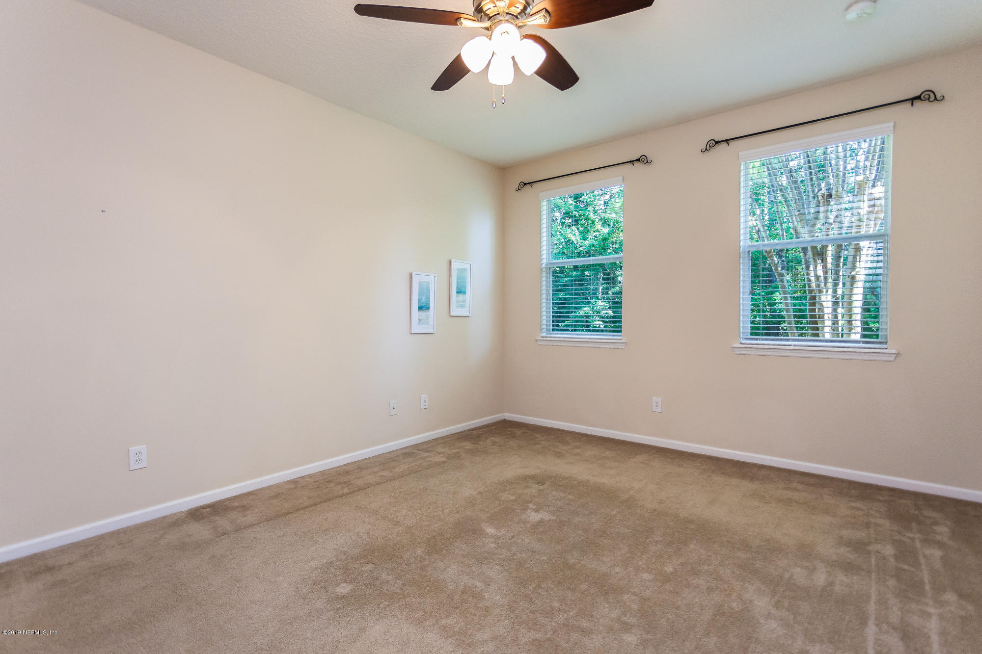 3256 Chestnut Ridge Way Orange Park, FL 32065 - Photo 9 of 39 an empty room with a window