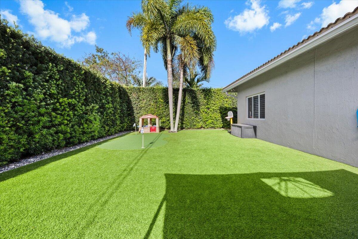 944 Southwest 1st Street Boca Raton, FL 33486 - Photo 39 of 48 Backyard Turf Area