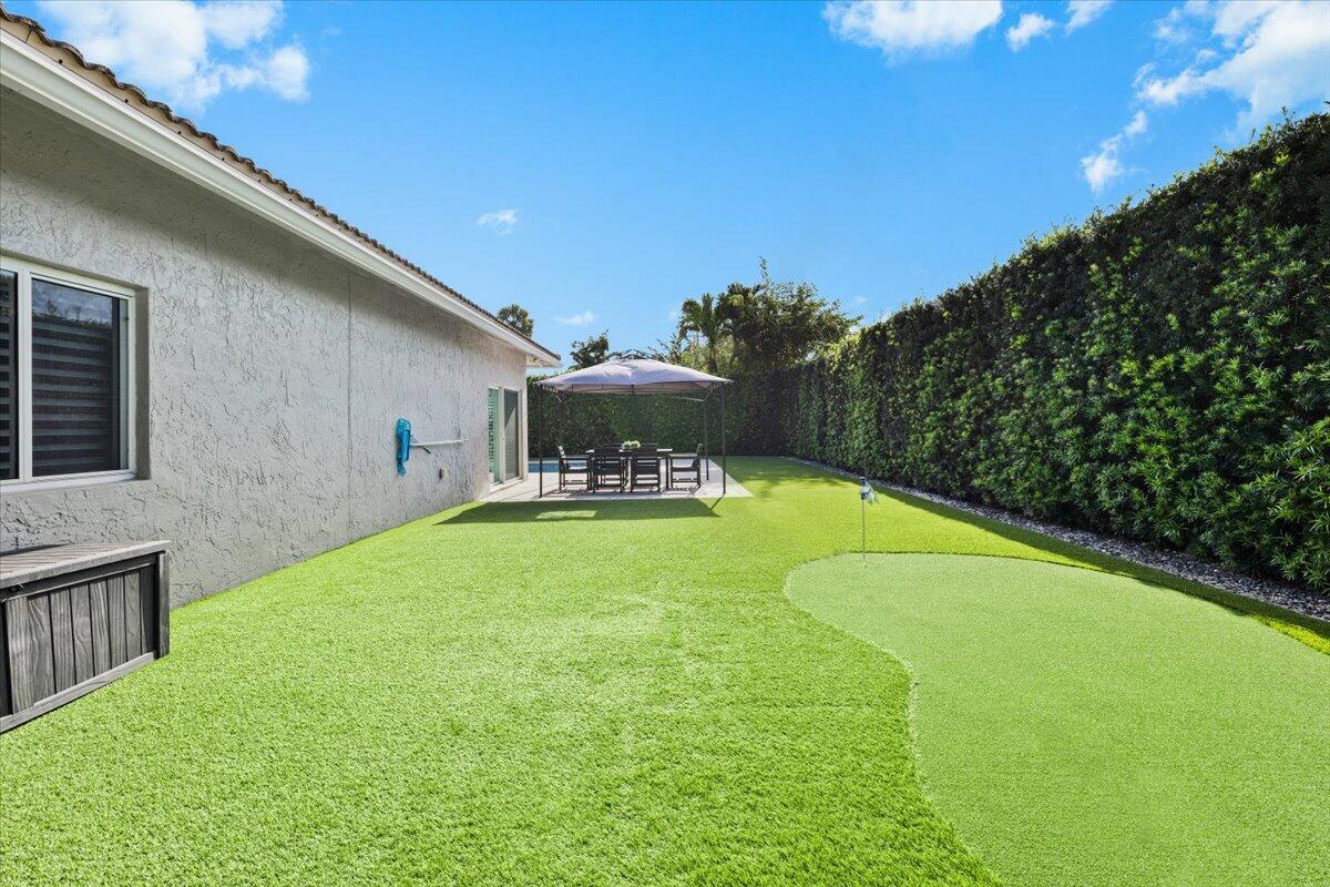 944 Southwest 1st Street Boca Raton, FL 33486 - Photo 40 of 48 Turf Yard with Putting Green