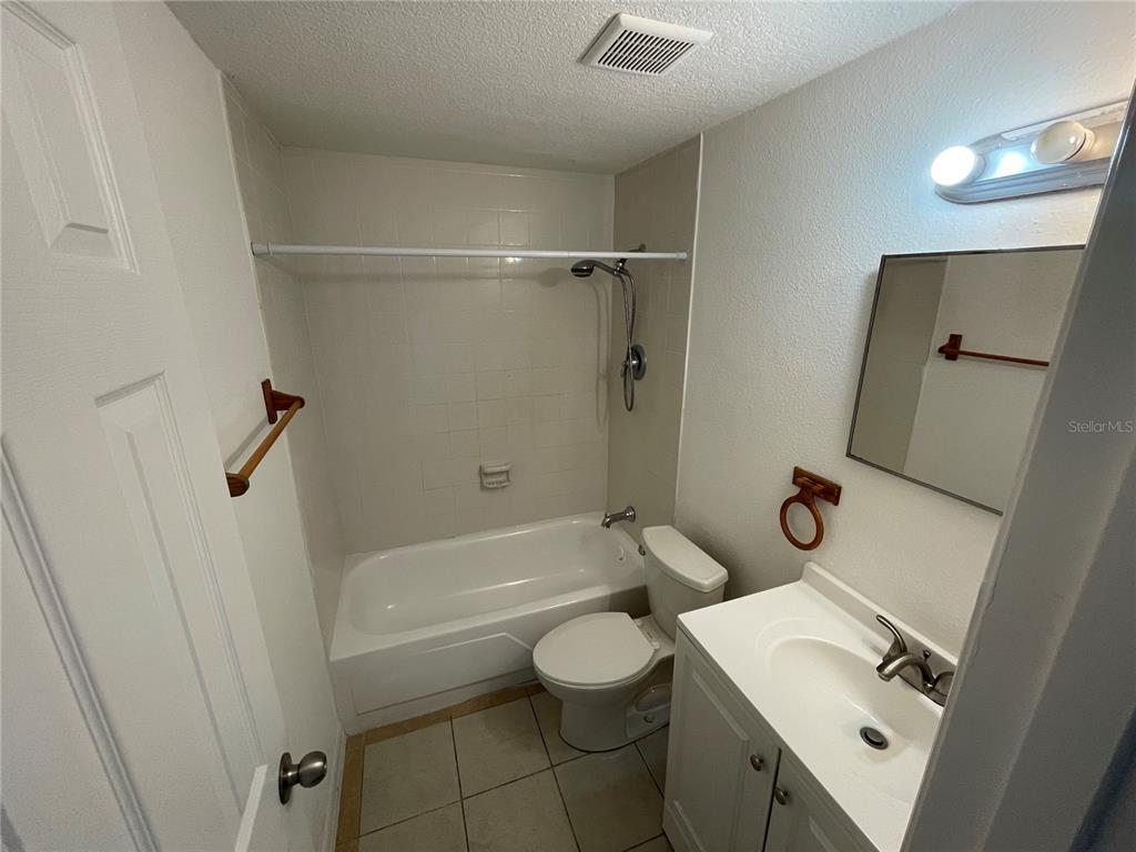 5317 Avery Road New Port Richey, FL 34652 - Photo 20 of 39 a bathroom with a sink a toilet and a bathtub