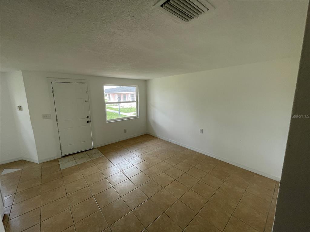 5317 Avery Road New Port Richey, FL 34652 - Photo 26 of 39 a view of an empty room and window