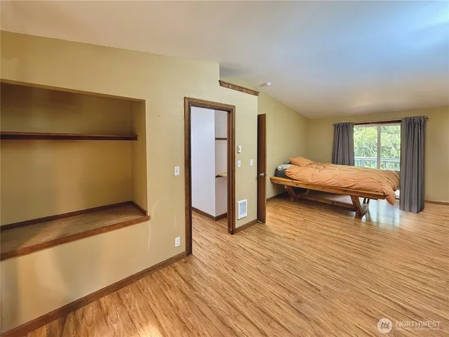 a balcony view with a seating space