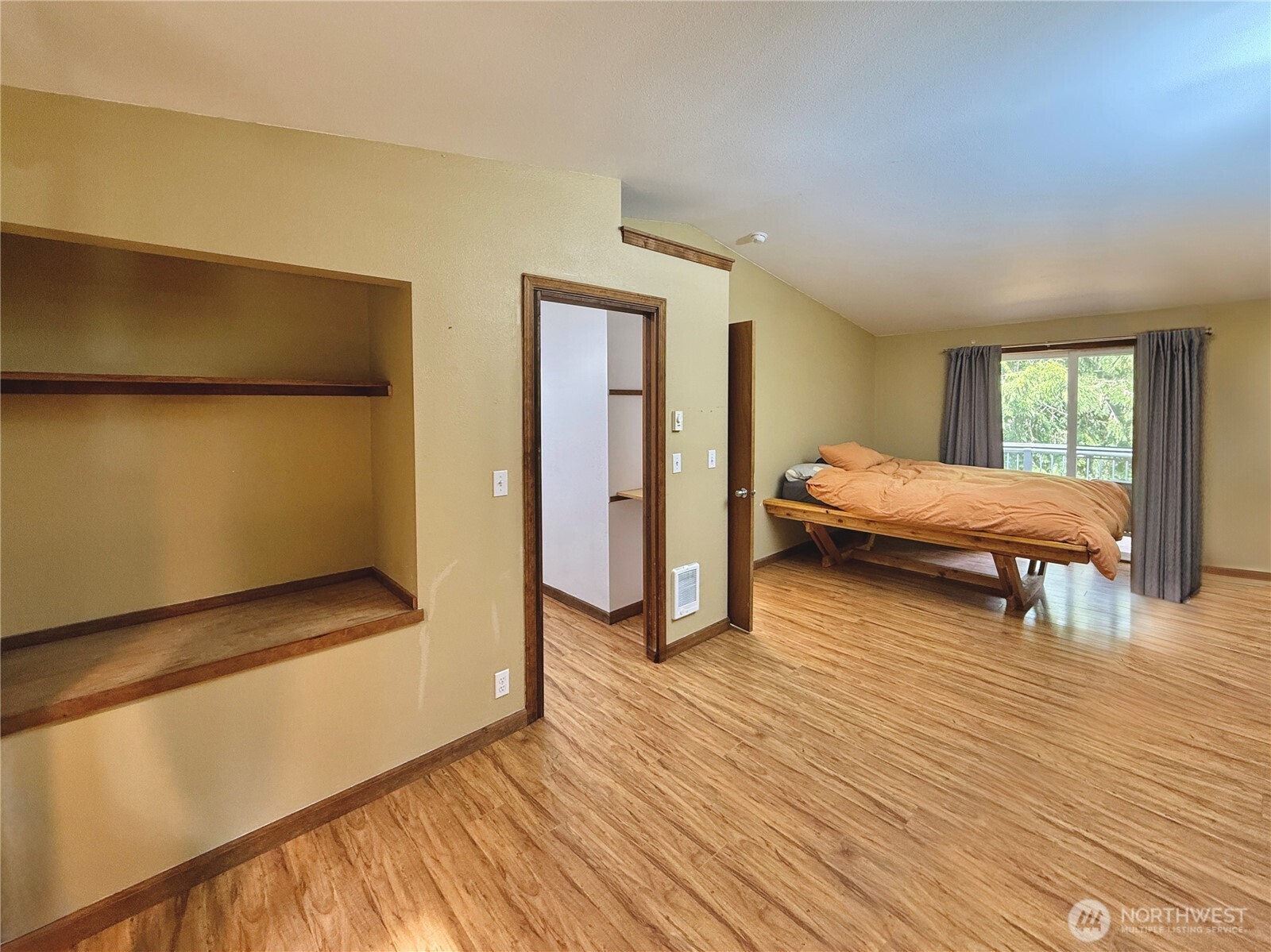 11422 Leschi Circle Anderson Island, WA 98303 - Photo 12 of 40 a bedroom with two beds and a window