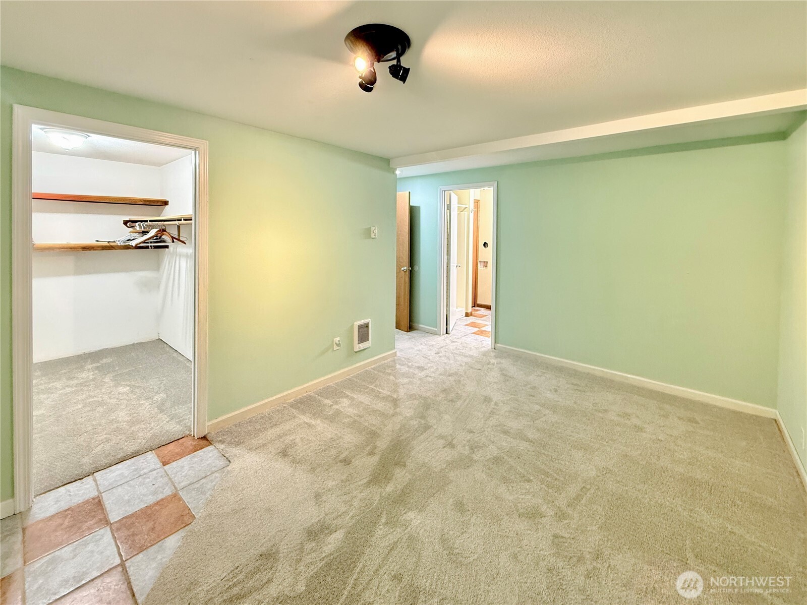 11422 Leschi Circle Anderson Island, WA 98303 - Photo 20 of 40 a view of a room with a open kitchen