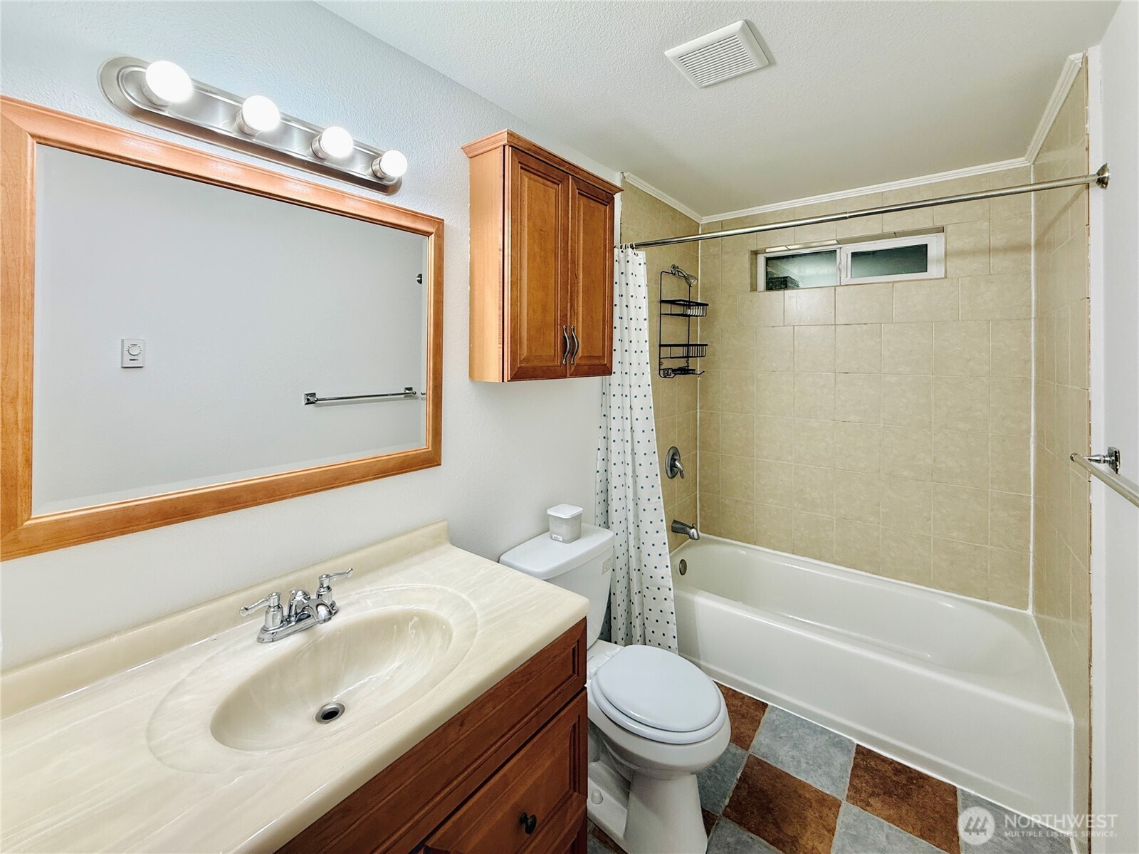 11422 Leschi Circle Anderson Island, WA 98303 - Photo 25 of 40 a bathroom with a sink a toilet and shower