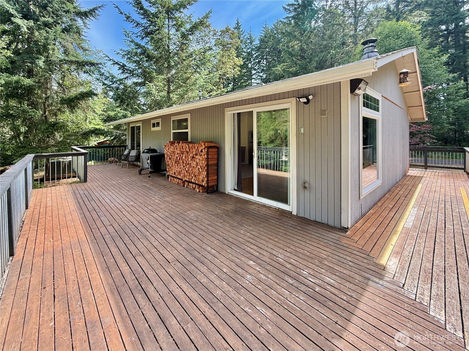 11422 Leschi Circle Anderson Island, WA 98303 - Photo 27 of 40 a view of a house with a roof deck