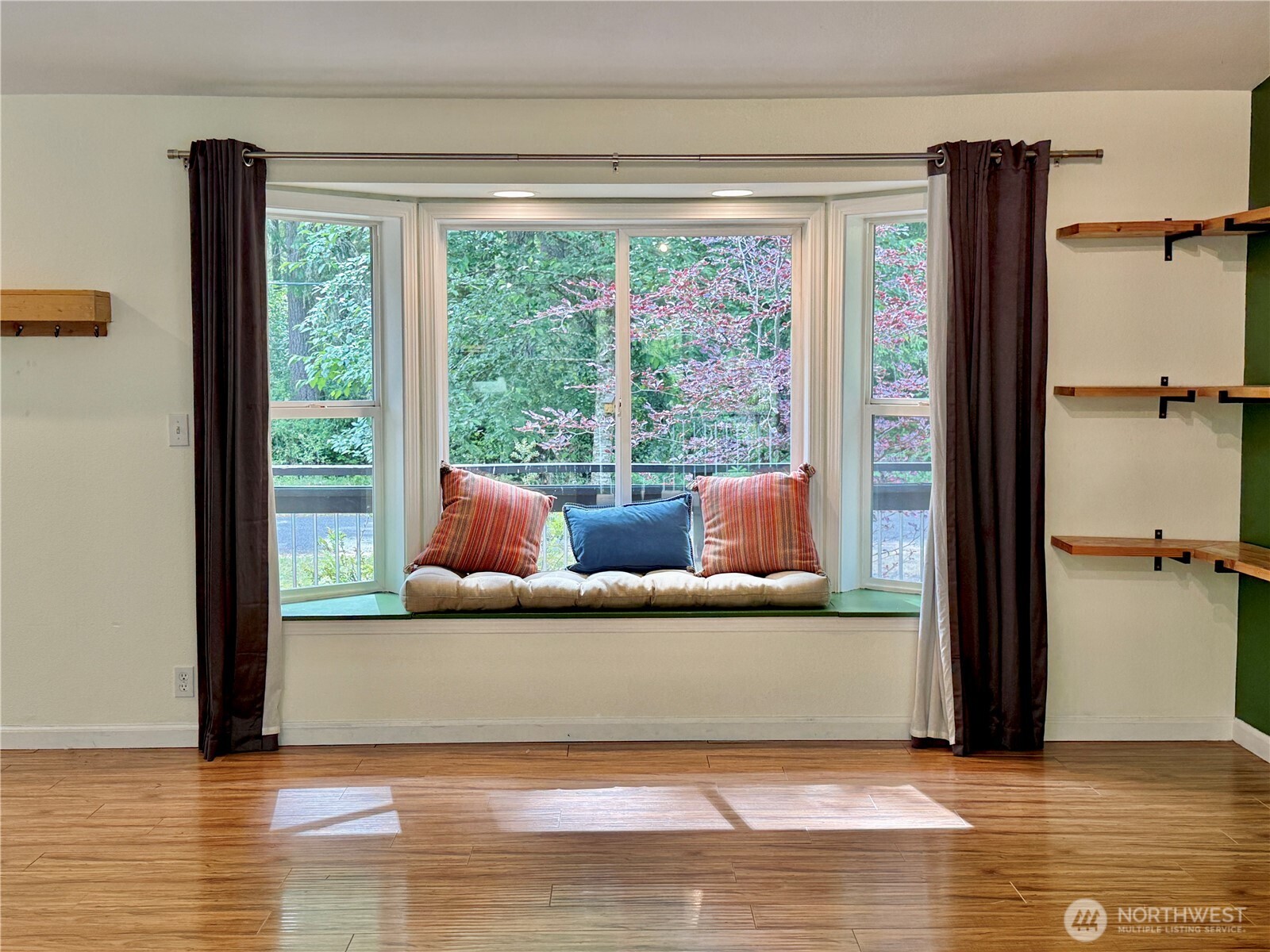 11422 Leschi Circle Anderson Island, WA 98303 - Photo 6 of 40 a living room with furniture and a window
