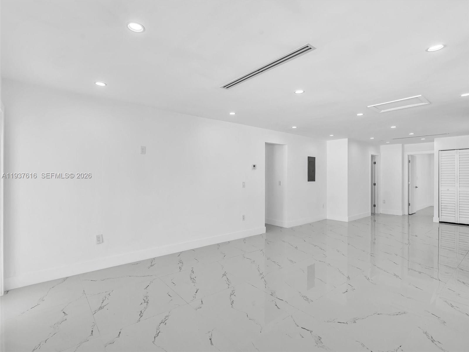3354 Northwest 50th Street, Unit 3354 Miami, FL 33142 - Photo 13 of 26 an empty room with white walls
