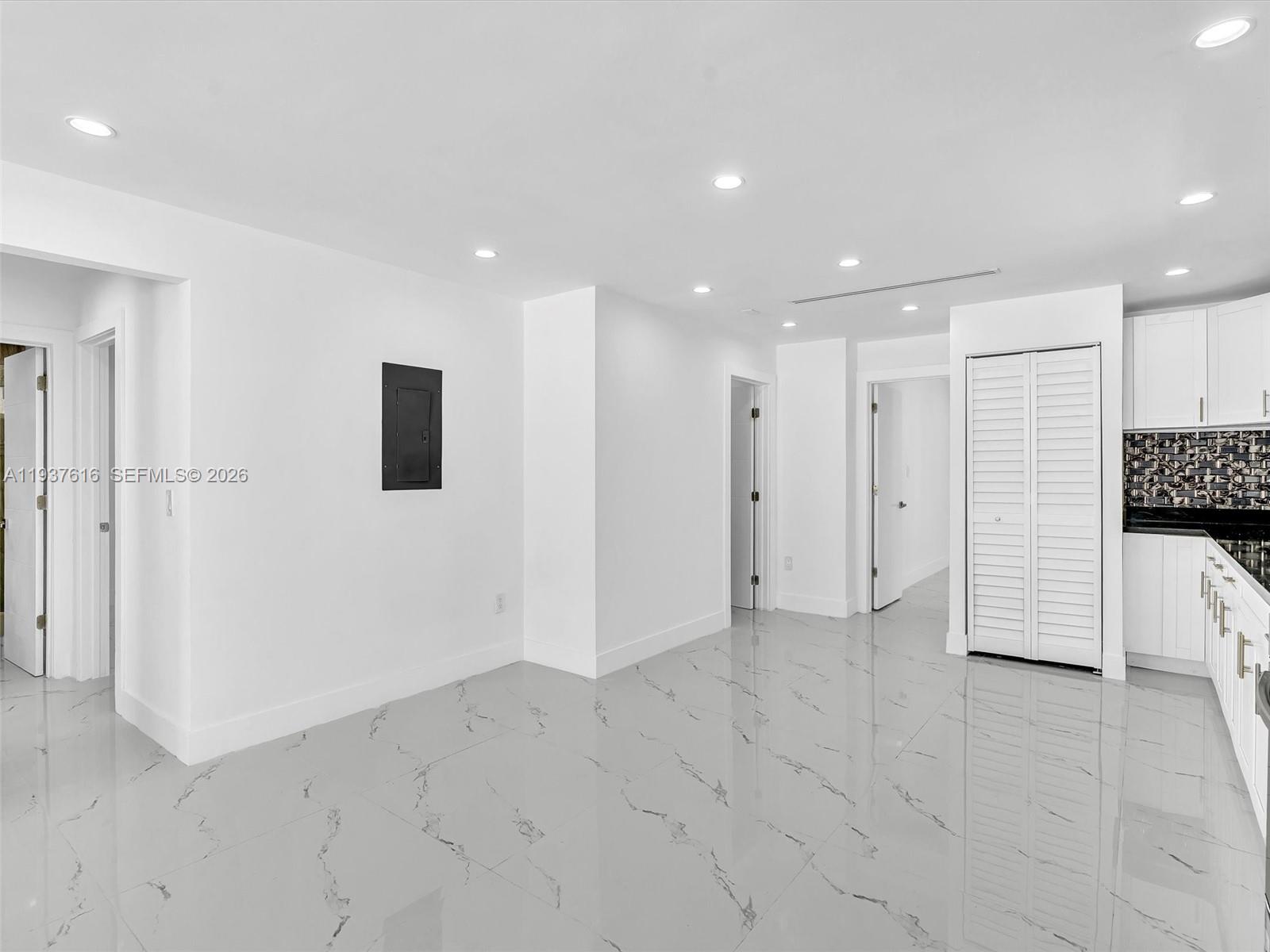 3354 Northwest 50th Street, Unit 3354 Miami, FL 33142 - Photo 14 of 26 a view of a kitchen with a refrigerator and window
